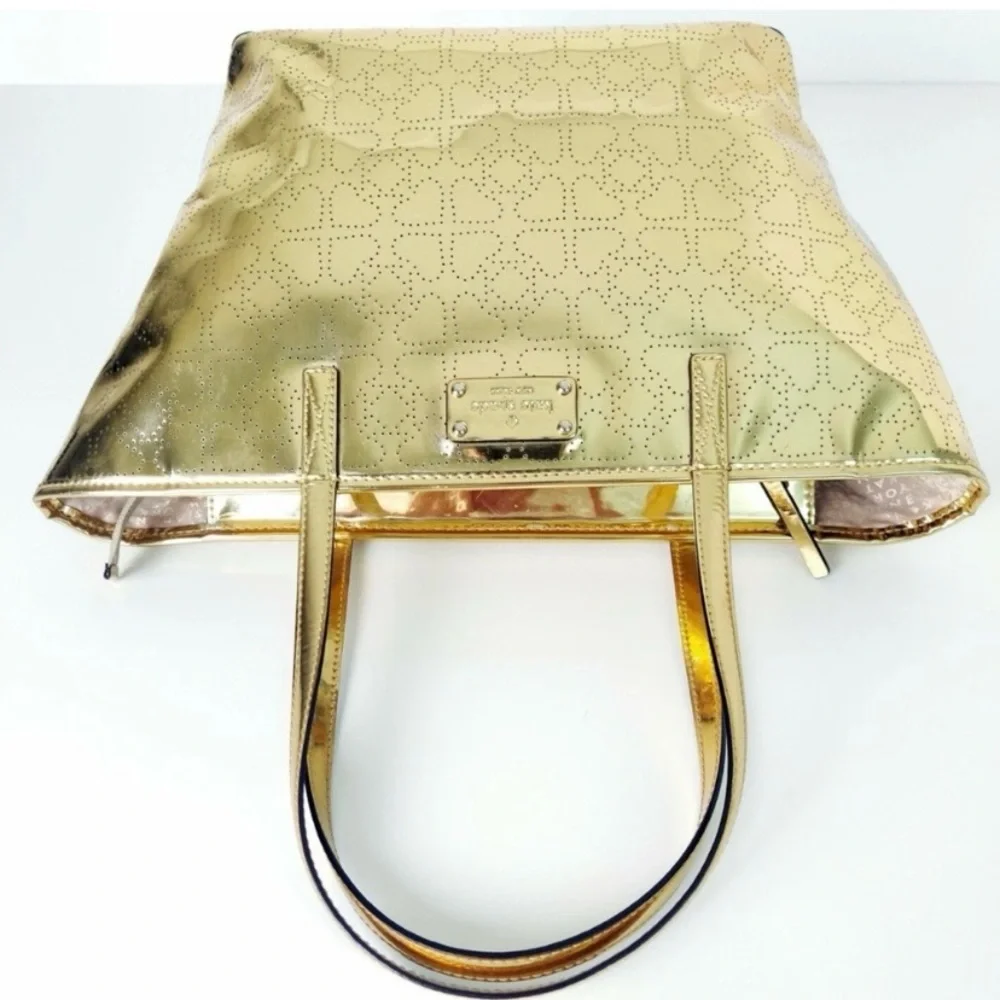 Kate Spade 2pc set Metro Spade Gold Tote and matching NWT Shiloh Pouch Set $356